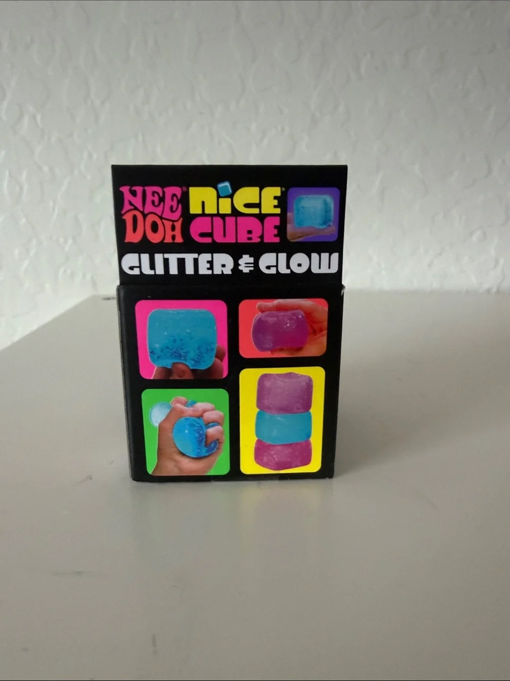 NEW unopened NeeDoh Nice Cube Glitter & Glow. Color purple.